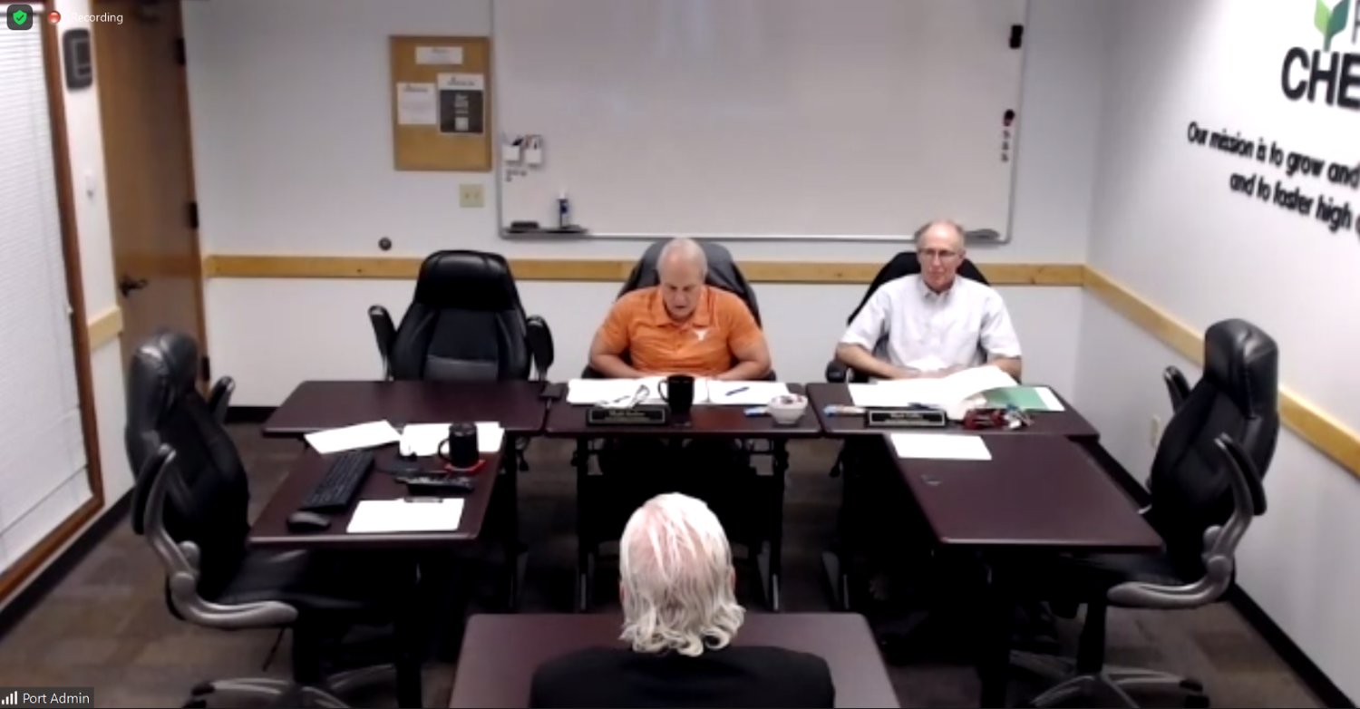 Port of Chehalis commissioners interview Paul Ericson in this screenshot from the virtual meeting.